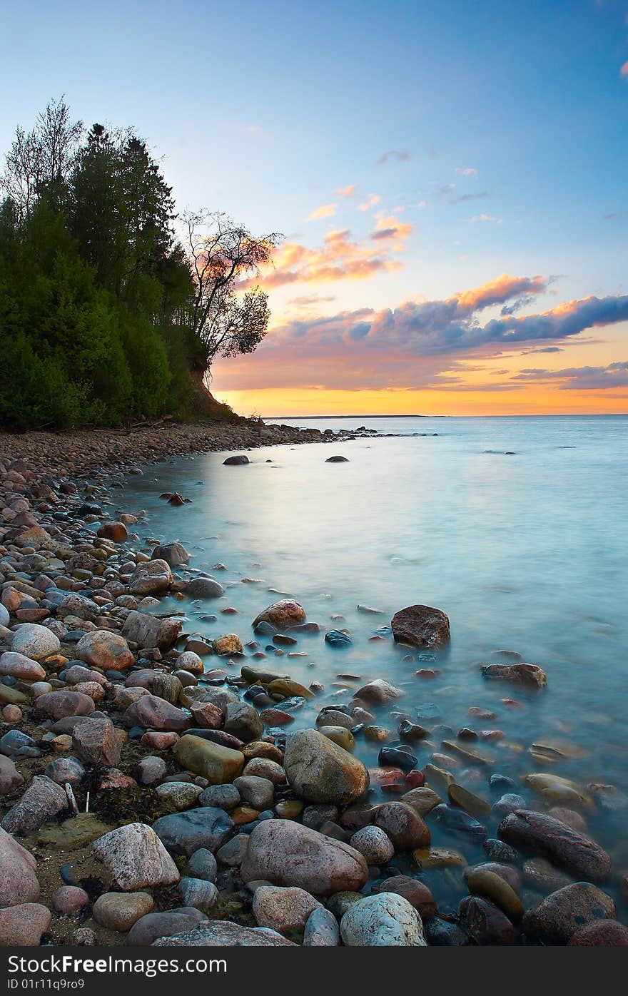 Beautiful sunset with sea and trees