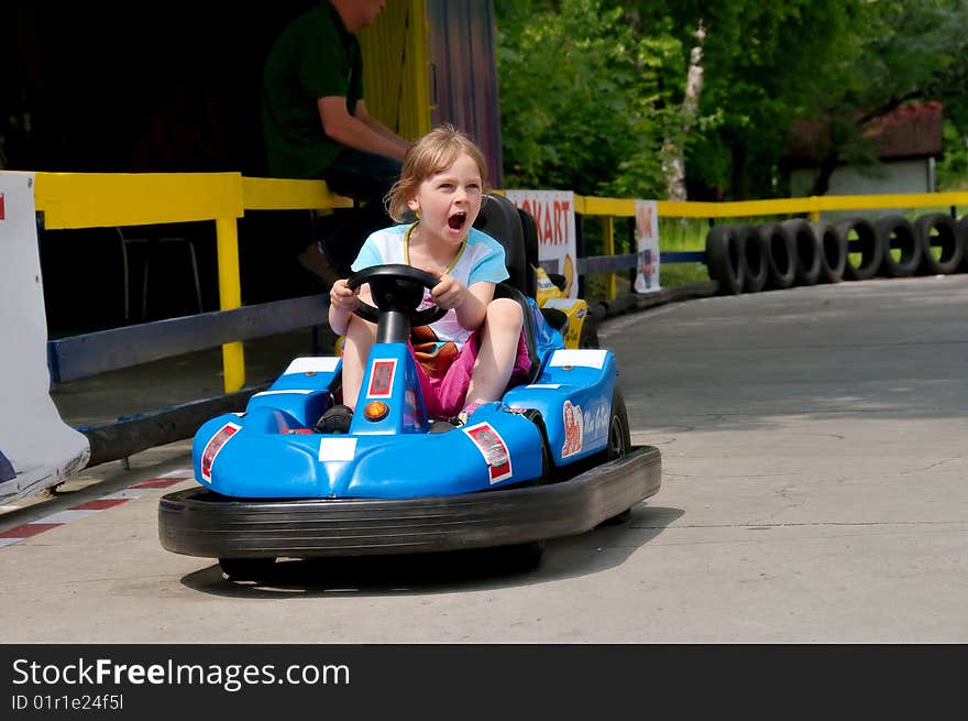 Girl is driving bumper car