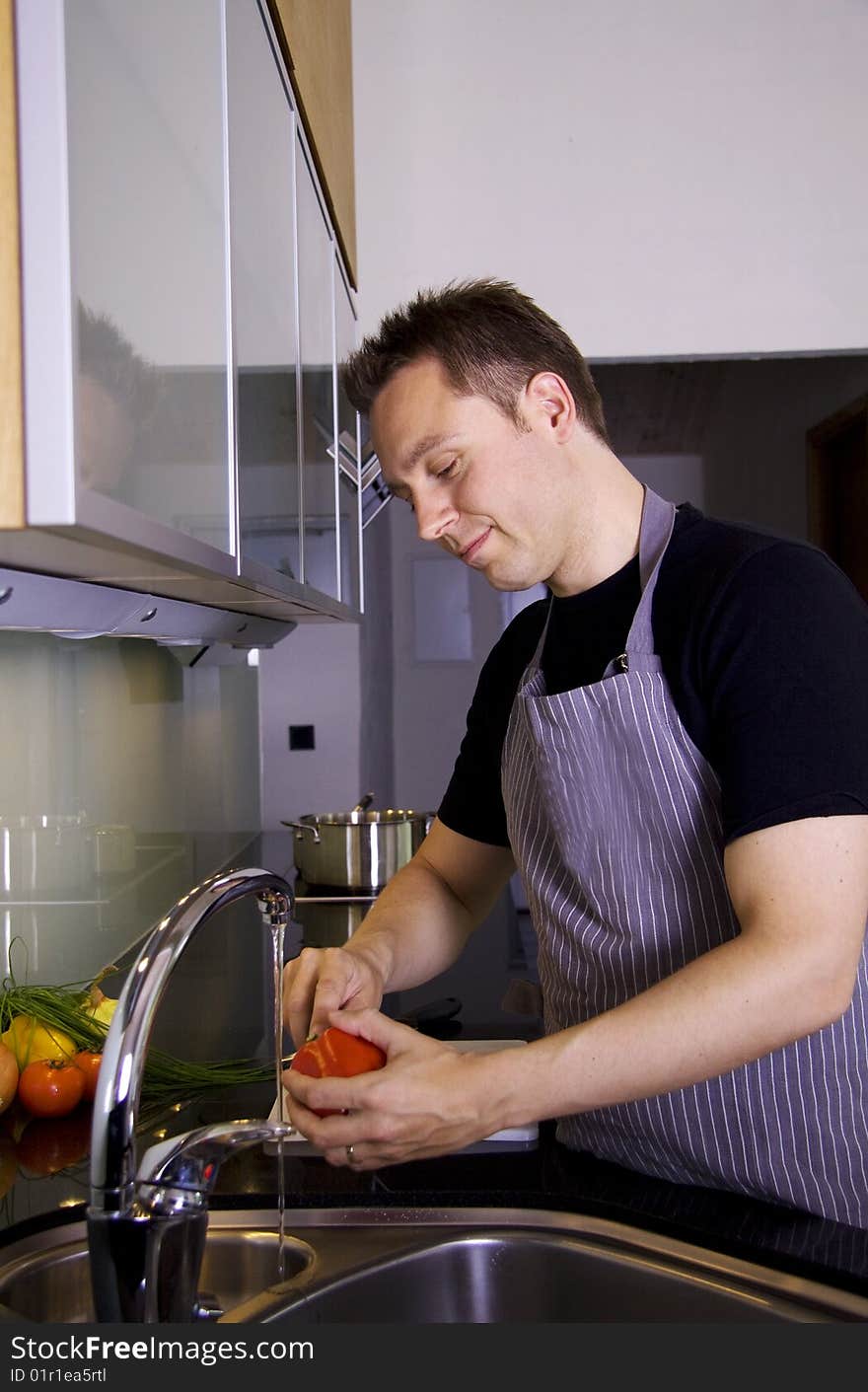 Chef washing vegetables