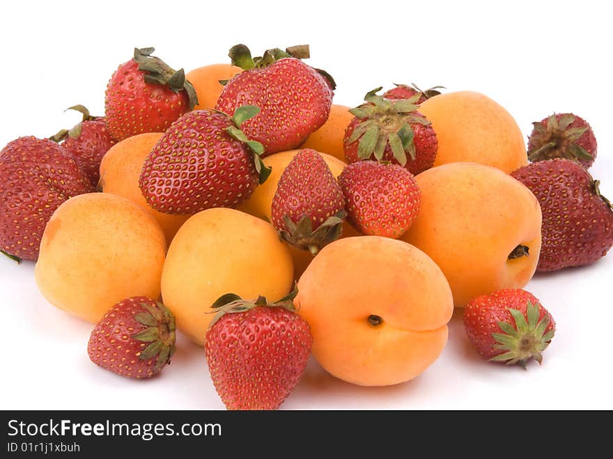 Fresh fruit. Strawberry and peaches. Isolated on white