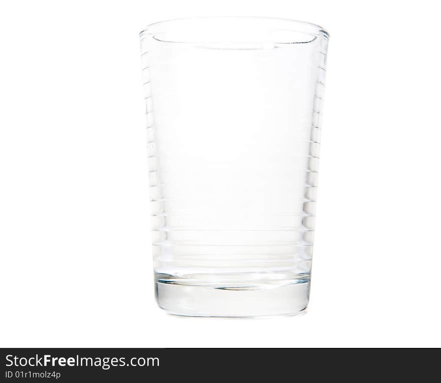 Empty glass on white ground