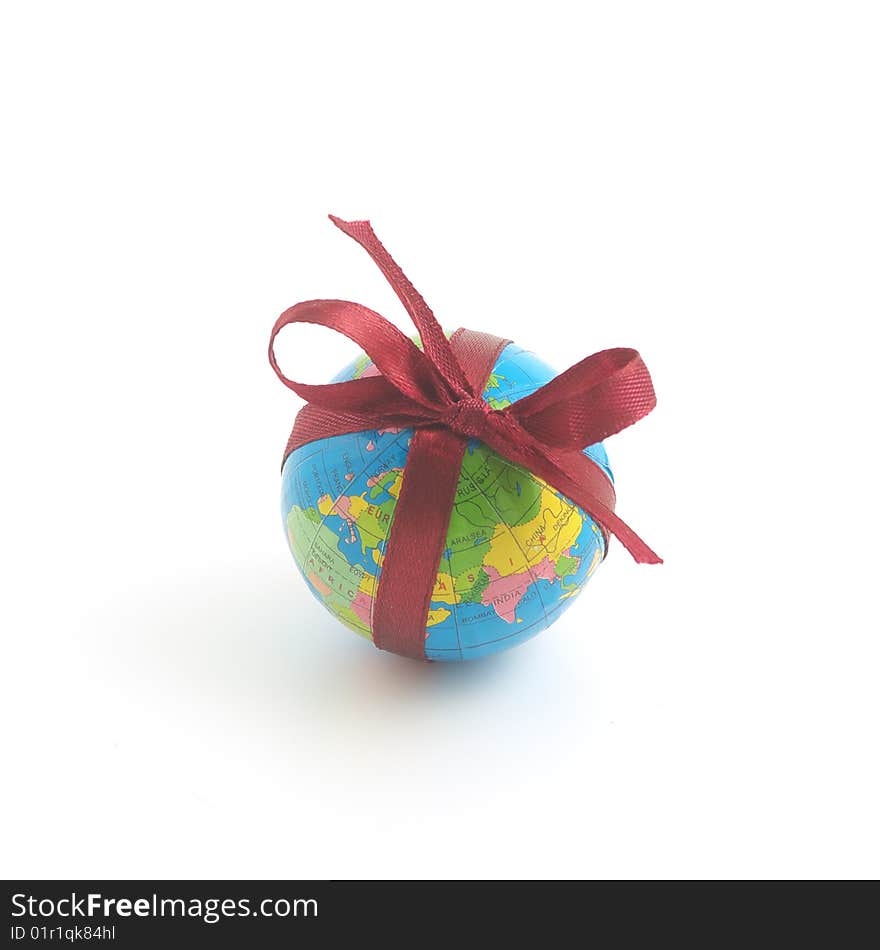 Globe and red ribbon. white background. Globe and red ribbon. white background