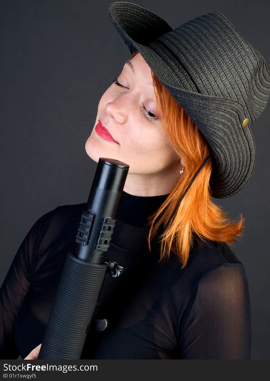 Woman looking down a barrel