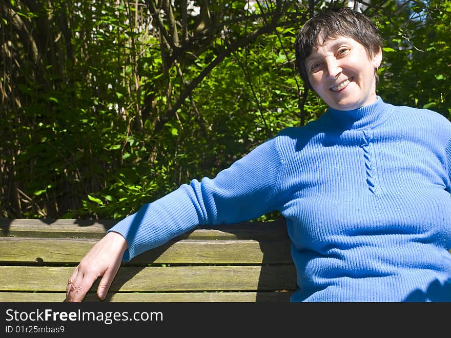 Aged woman in the park