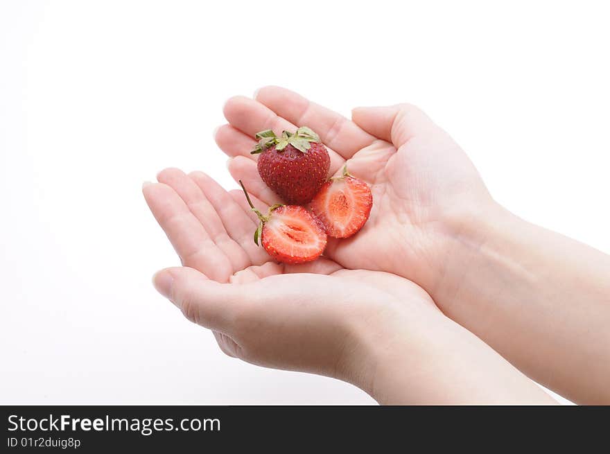 Hands of a woman with strawberry. Hands of a woman with strawberry