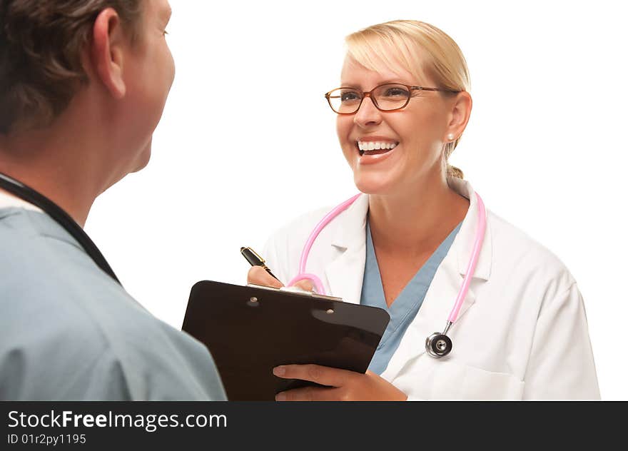 Male and Female Doctors Talking Over File.