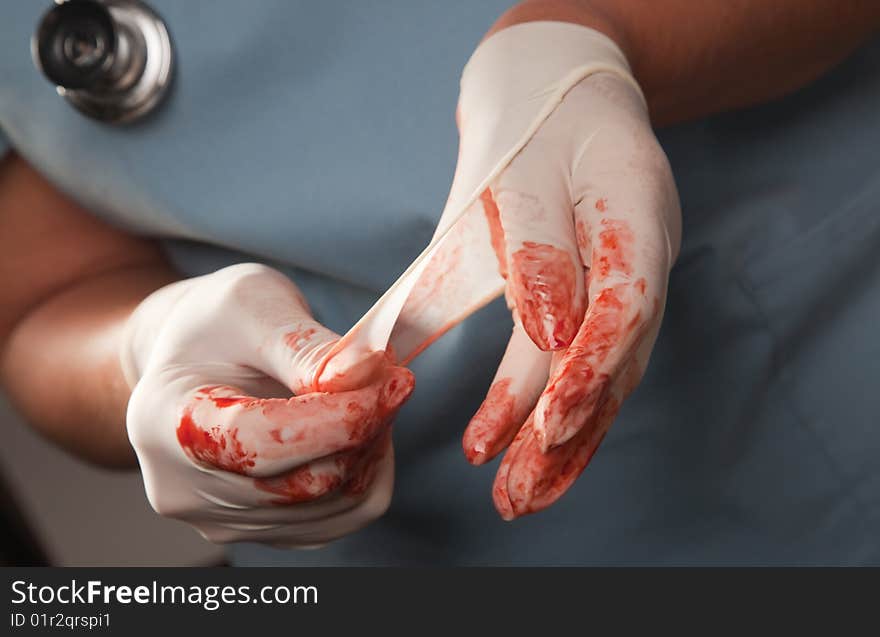 Abstract of Doctors Bloody Surgical Gloves