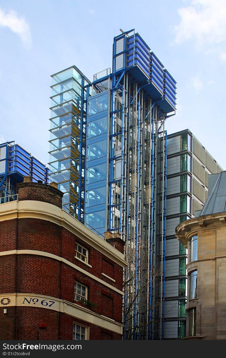 London older buildings in foreground of modern building. London older buildings in foreground of modern building.