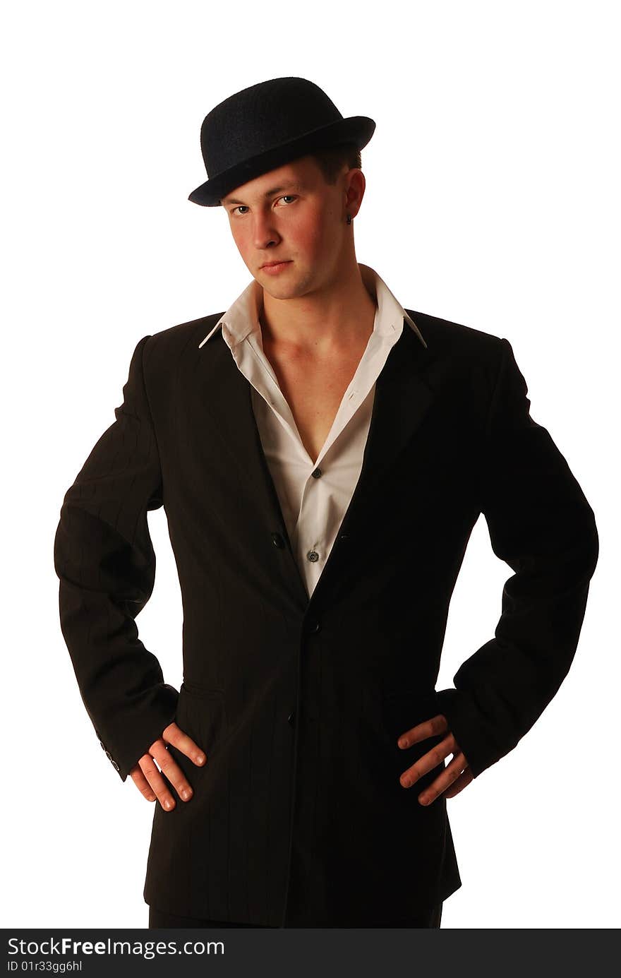 The young man in a suit and a soft felt hat.