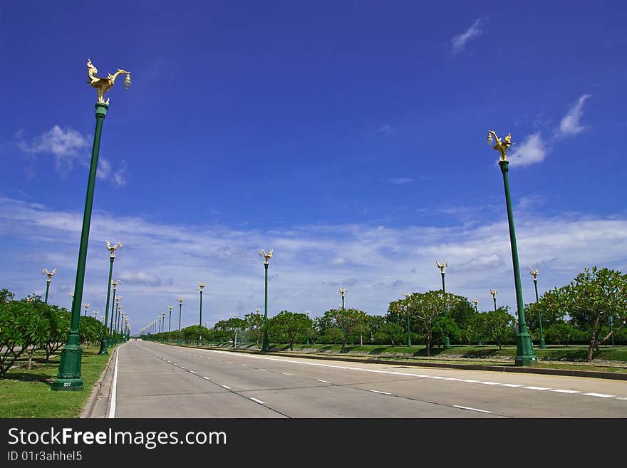 Road with many beautiful Thai style light pillars. Road with many beautiful Thai style light pillars.