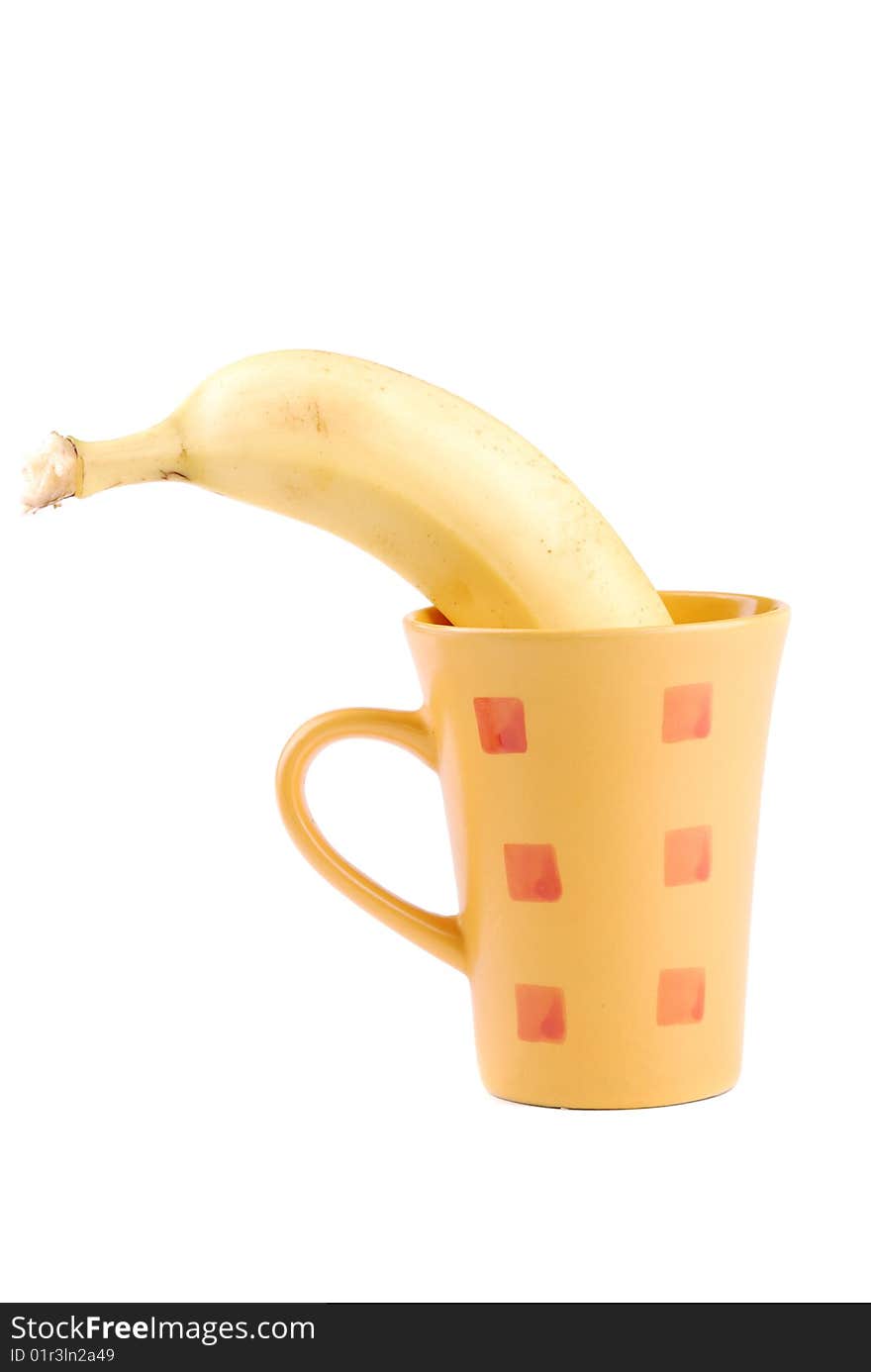 Yellow banana in a cup