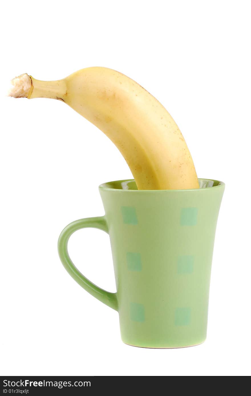 Yellow banana in a cup