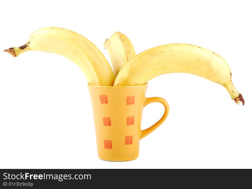 Yellow banana in a cup