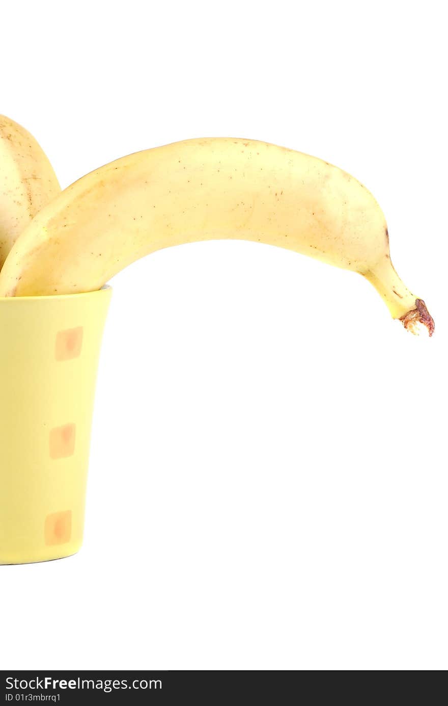 Yellow banana in a cup