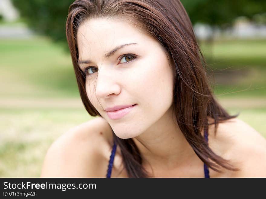 A Beautiful Brunette in a collared shirt with an edge