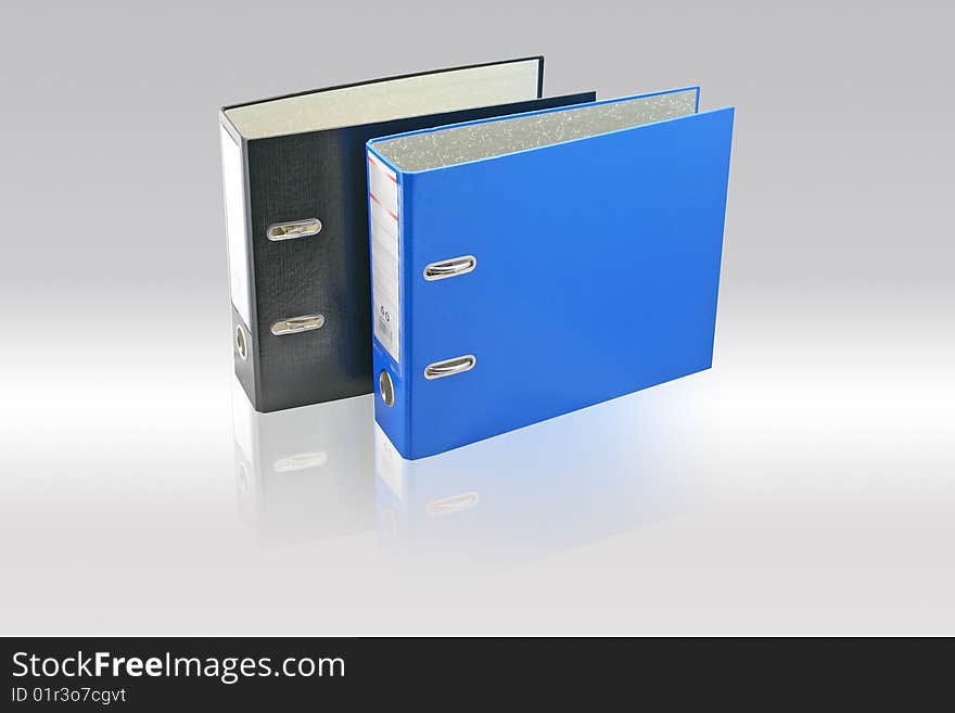 Two business folders black and blue.