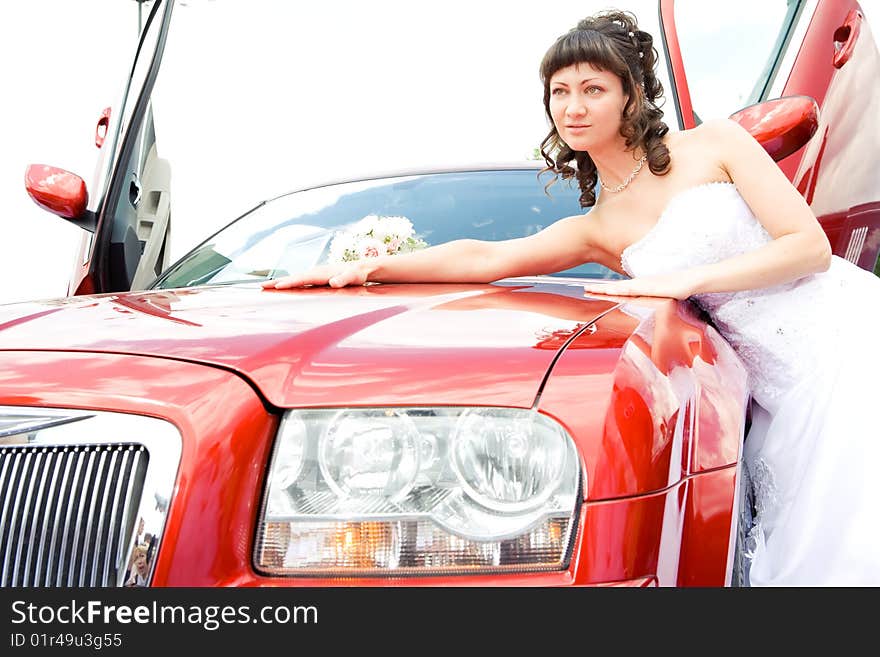 Beauty bride woman with limousine