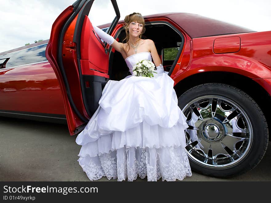 Beauty bride woman with limousine