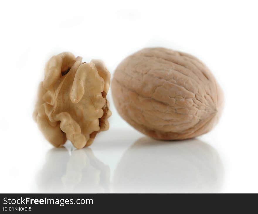 Macro of nutmeat and nuts in white background