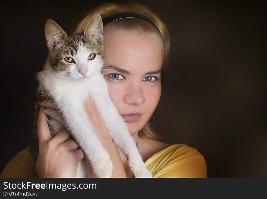 Young woman and her cute cat - portrait. Young woman and her cute cat - portrait