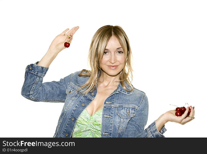 Beautiful woman with a cherry isolated on white