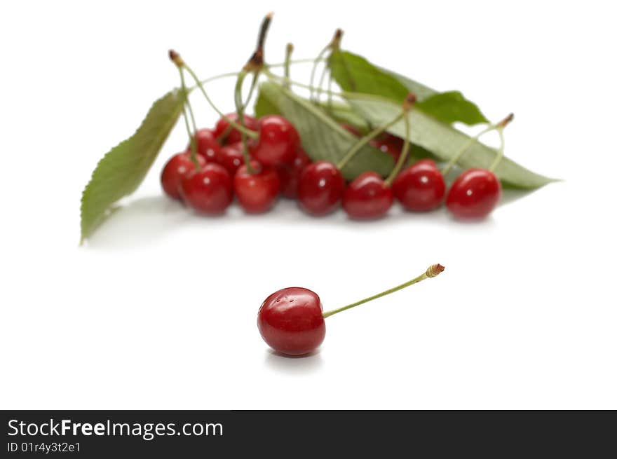 Red riped cherry on white background