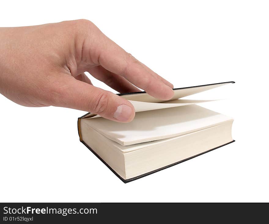 Color photo of an open book and hands