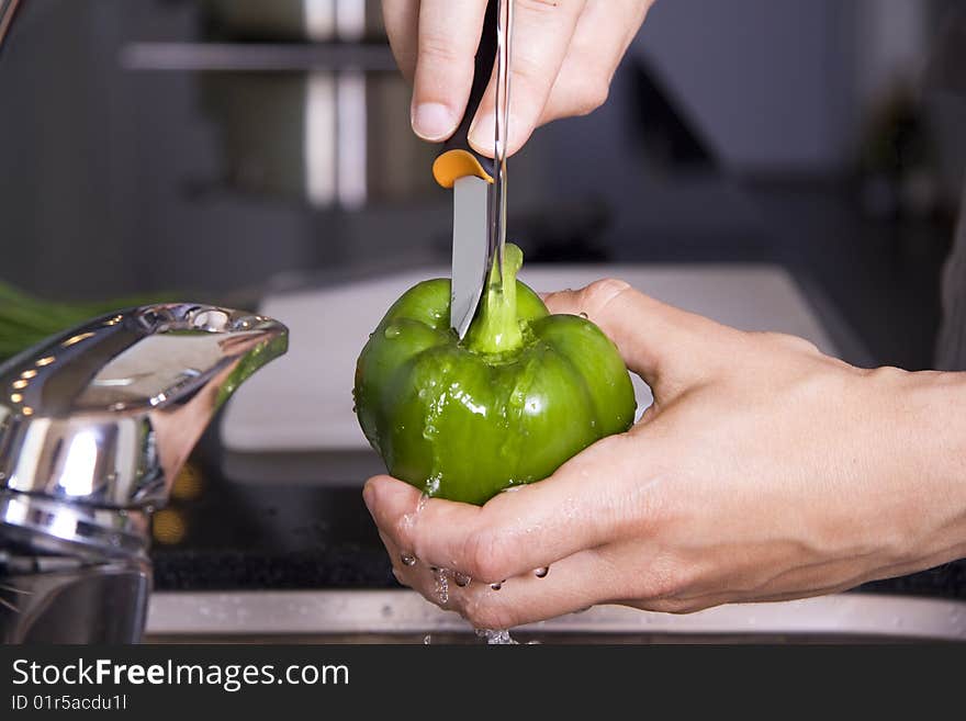 Washing A Green Pepper