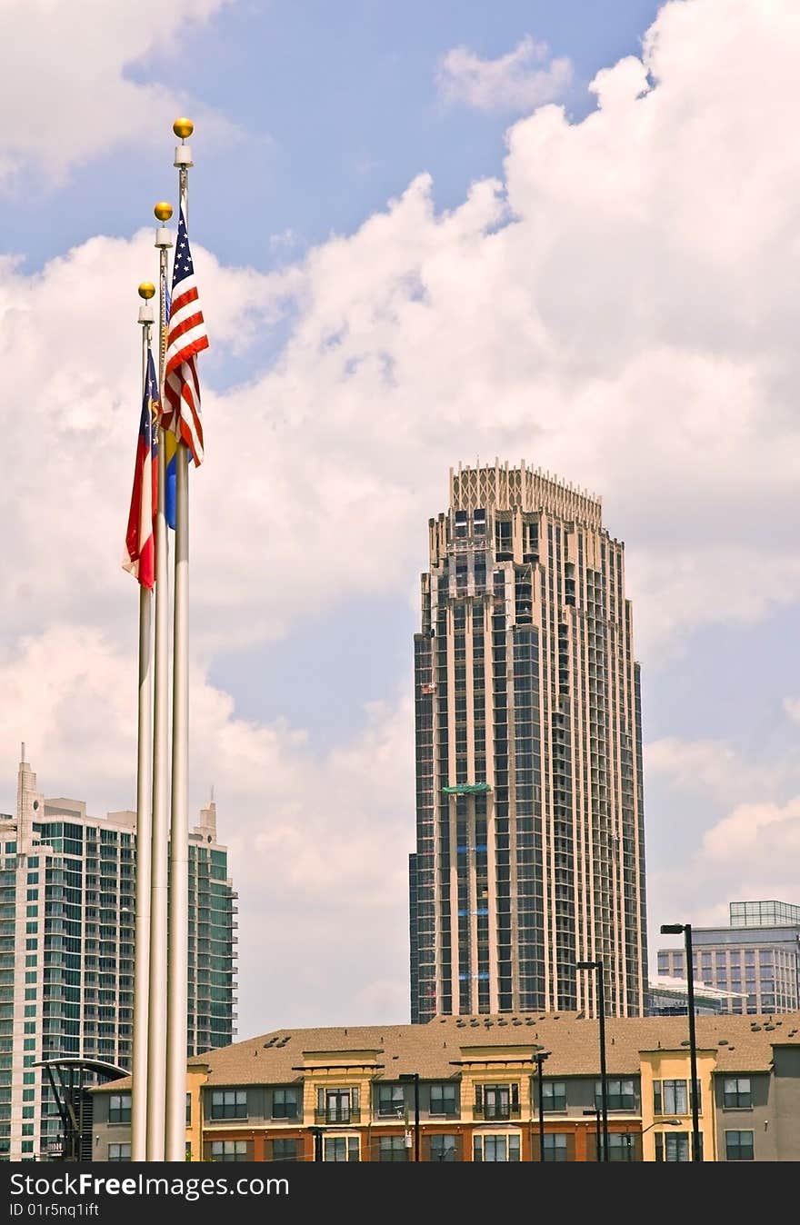 Buildings and Flags Against Sky