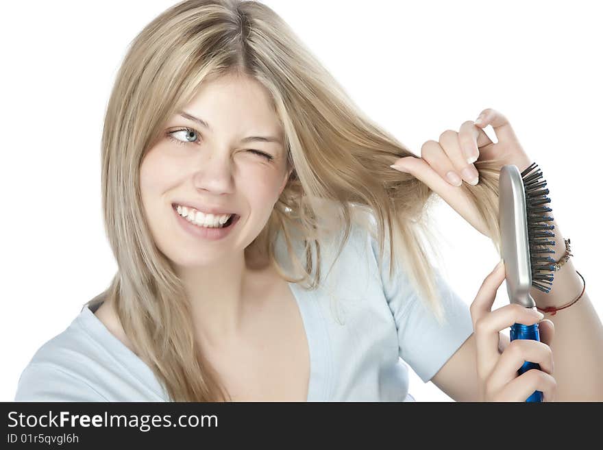 Woman combing her hair