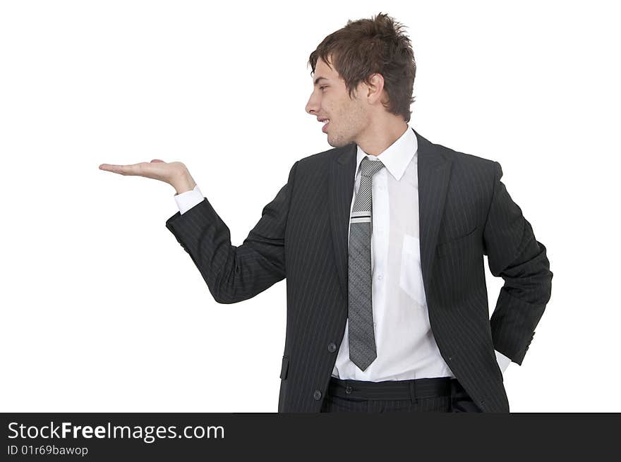 Young man in suit holding an object. Young man in suit holding an object