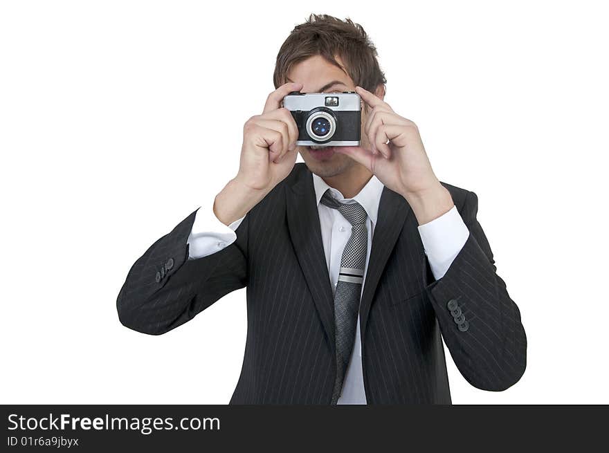 Young man in suit taking a photo. Young man in suit taking a photo