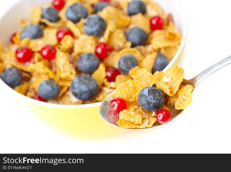 Bowl of corn flakes with fresh fruits. Bowl of corn flakes with fresh fruits