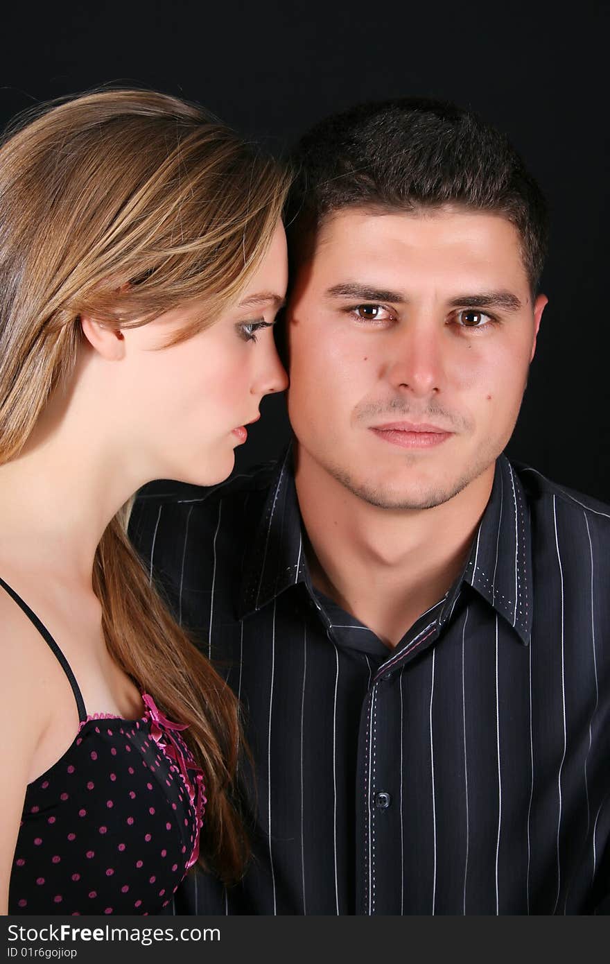 Young couple in love, faces close to one another