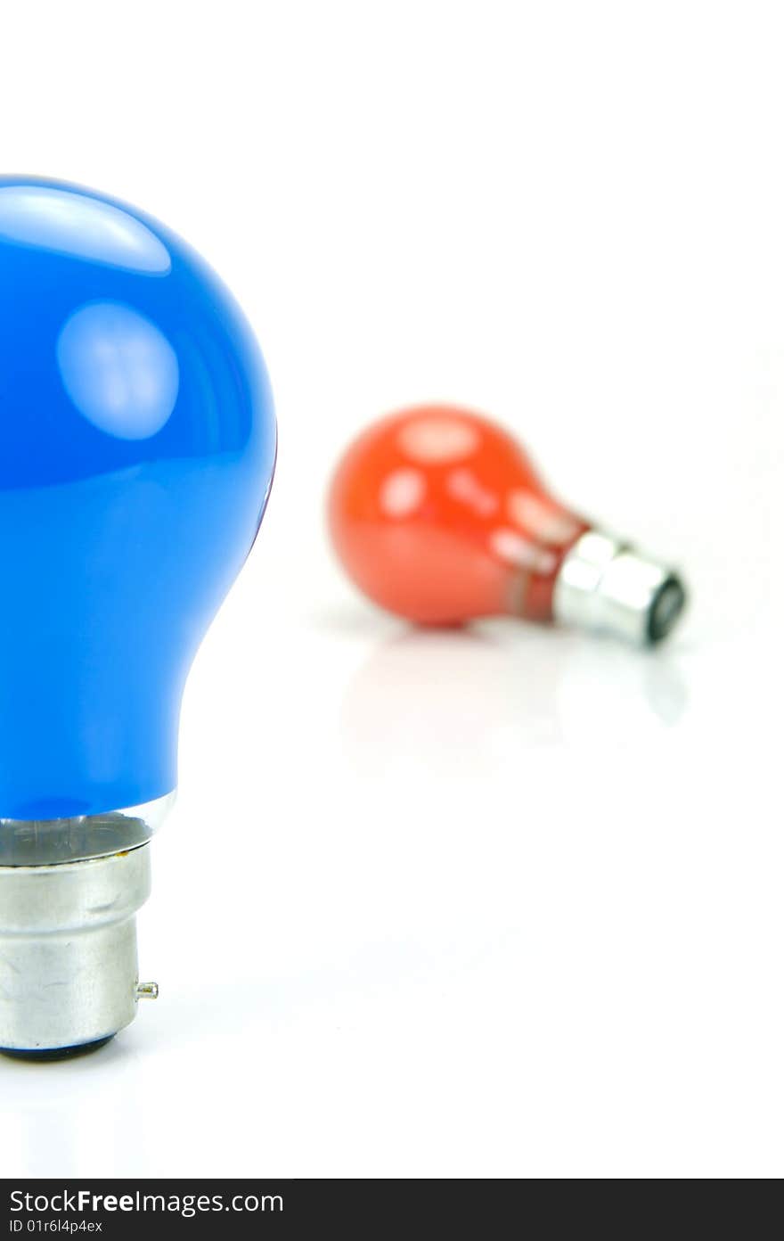 Colored light bulbs isolated against a white background