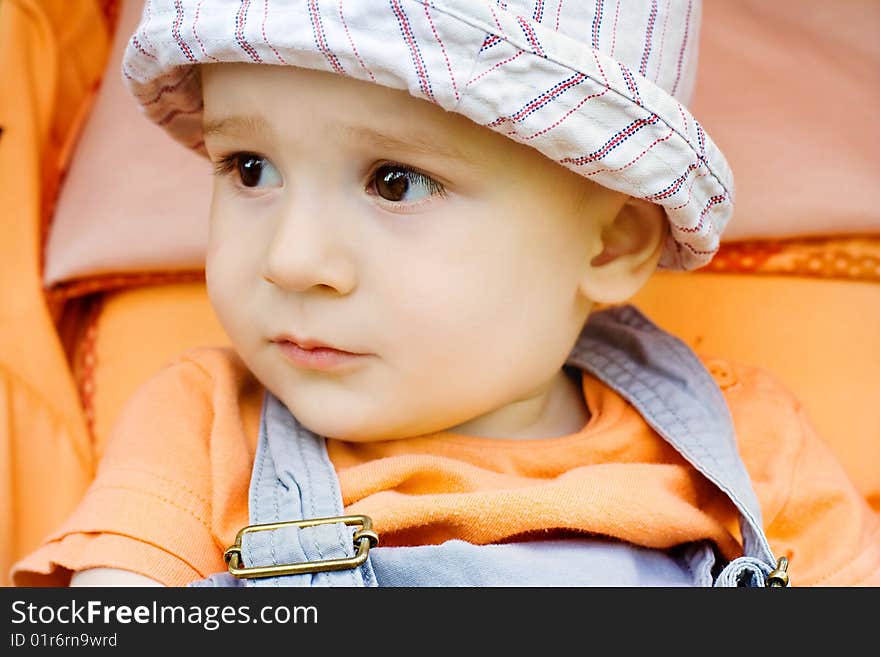 Portrait of the little boy looking on the right