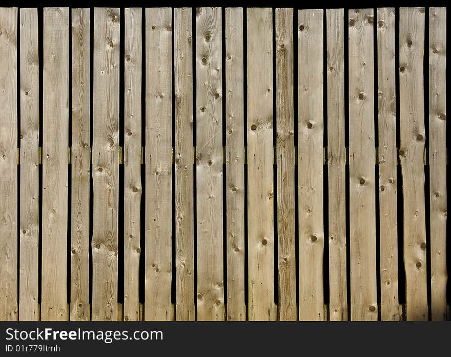 Fence of old wooden plank