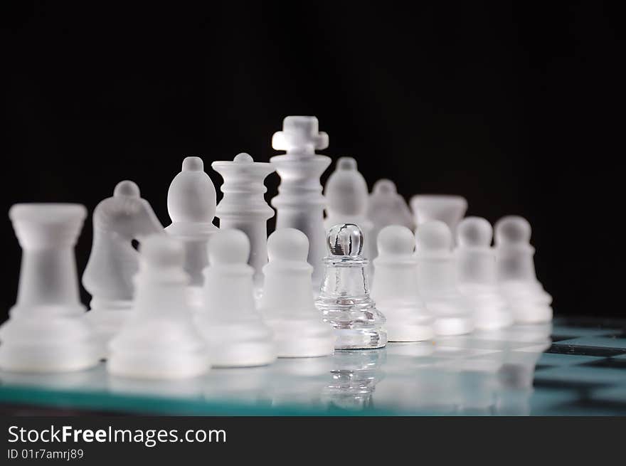 Raws of chess pieces same kind with one different pawn among them. Raws of chess pieces same kind with one different pawn among them