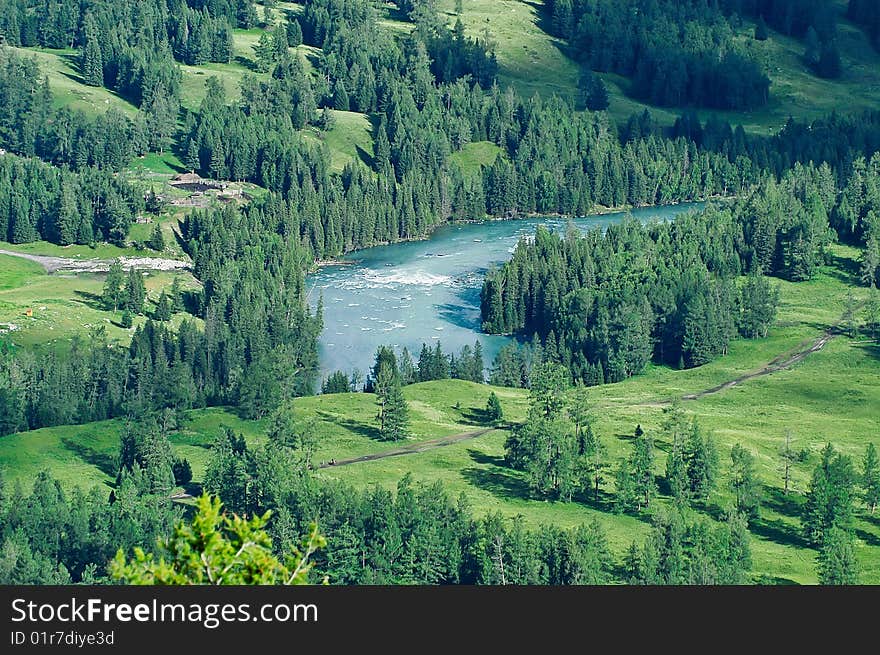 A meandering river through Forests and fields. A meandering river through Forests and fields