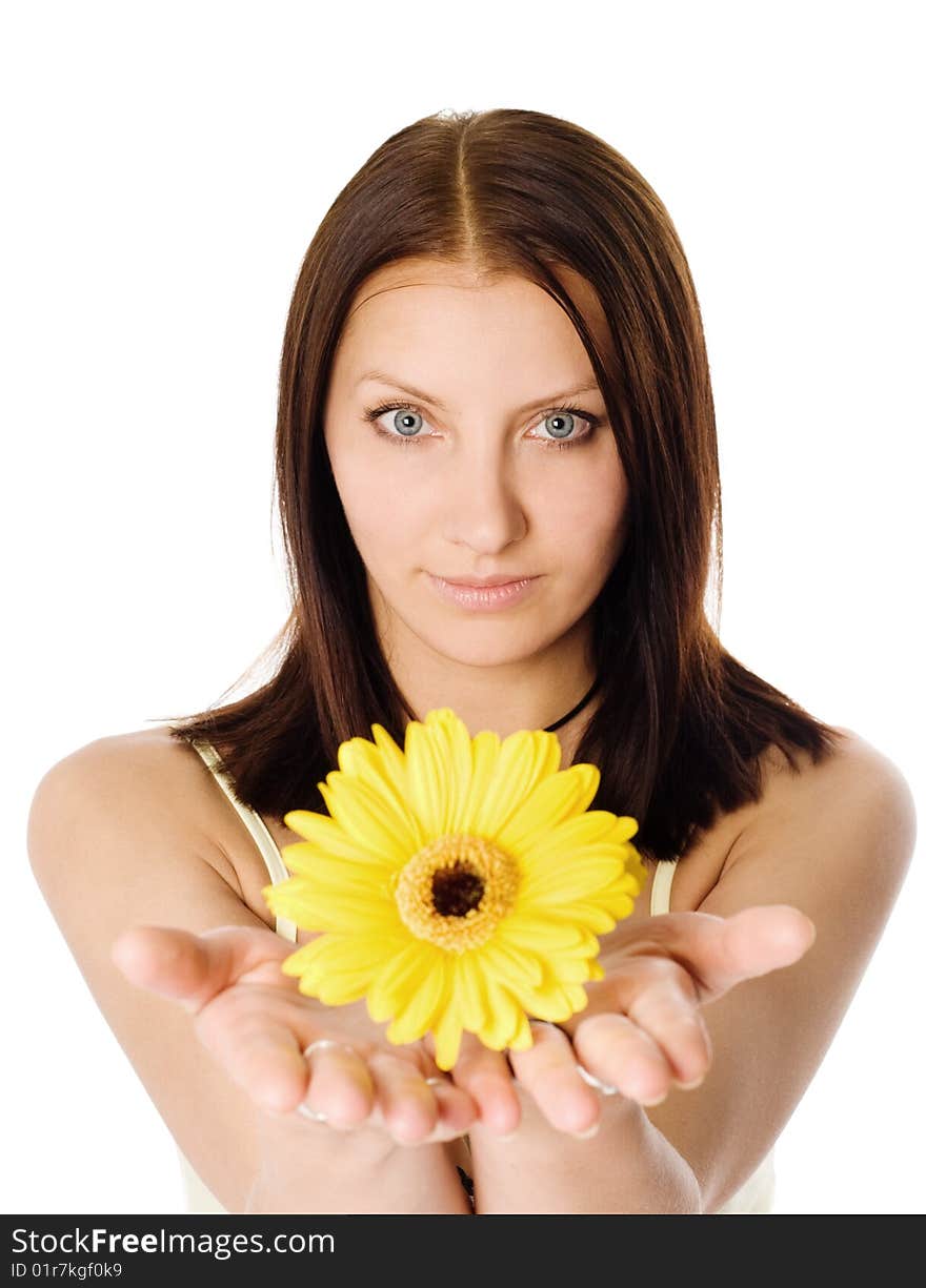 An image of a young girl with a flower