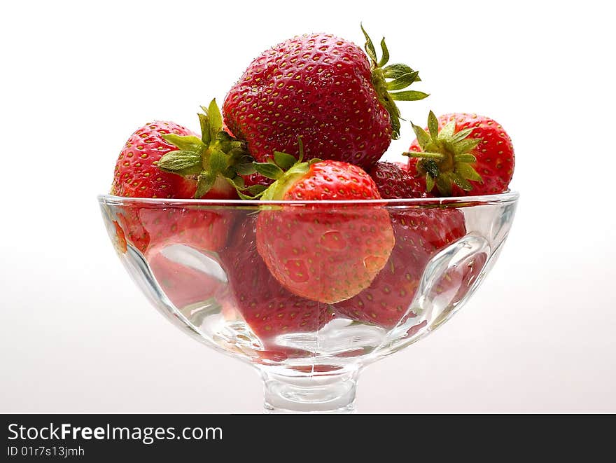 Several fresh strawberries in a glass. Several fresh strawberries in a glass