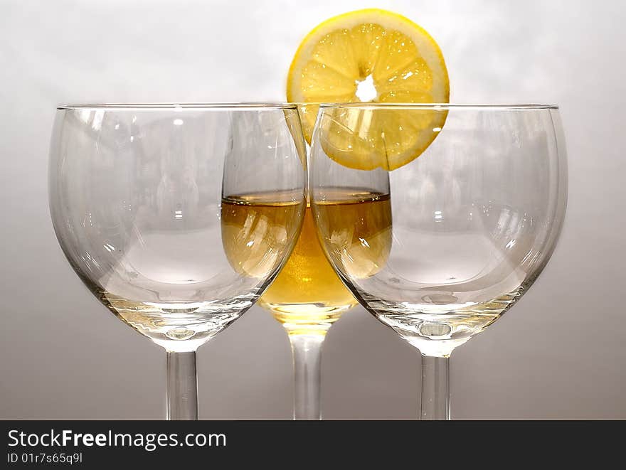 The drink in the glass with an orange