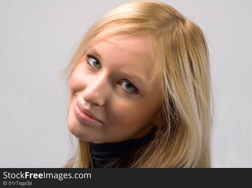 Portrait of a beautiful young blond female, isolated on white. Portrait of a beautiful young blond female, isolated on white