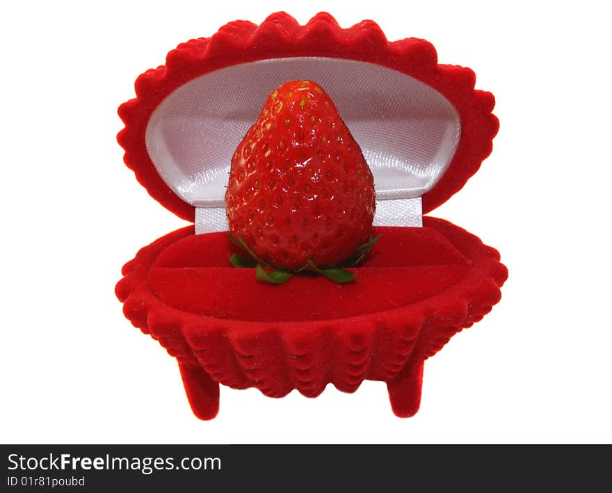 Strawberry in a box, the gift, on a white background, is isolated. Strawberry in a box, the gift, on a white background, is isolated.