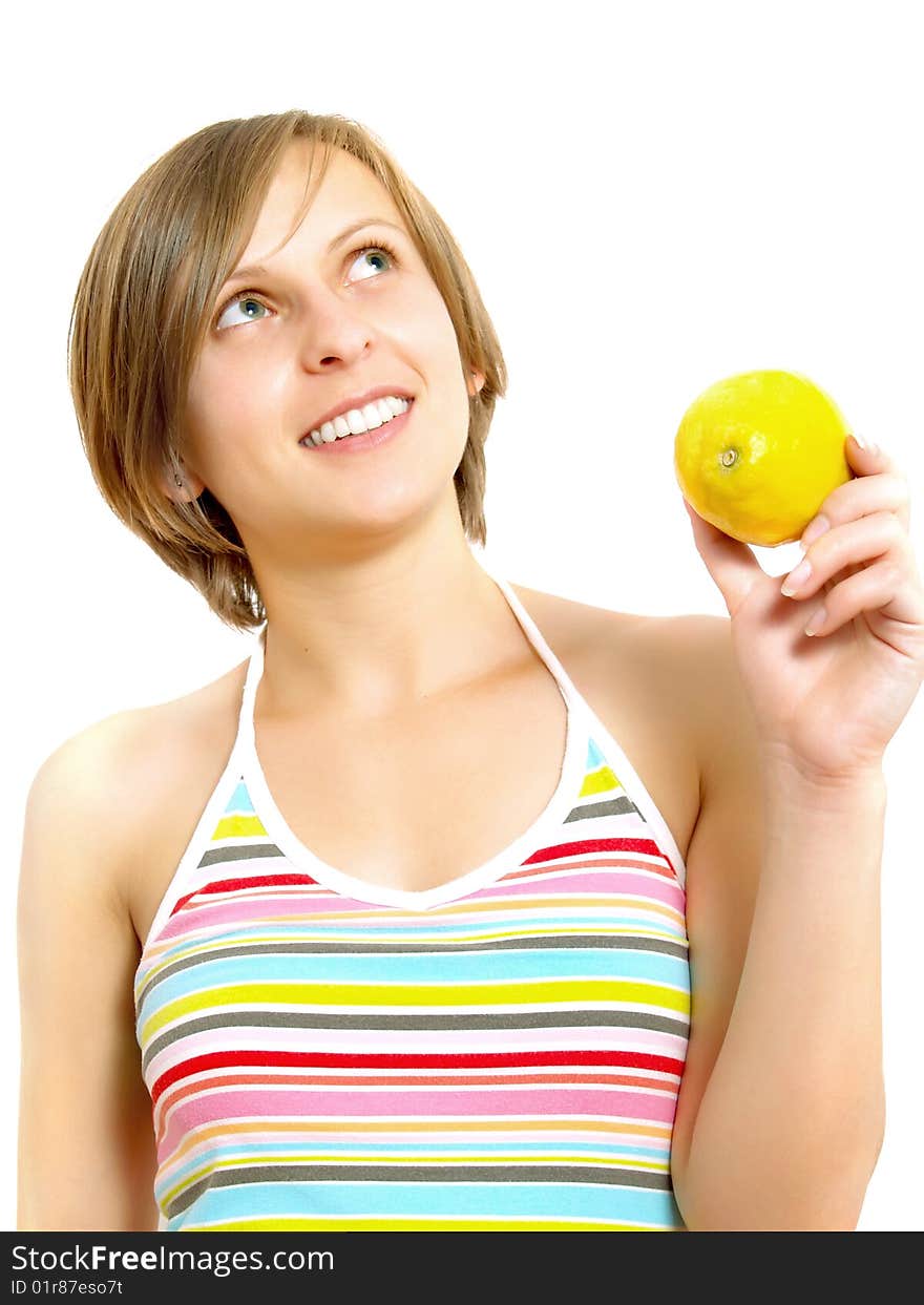 Happy girl holding a fresh lemon