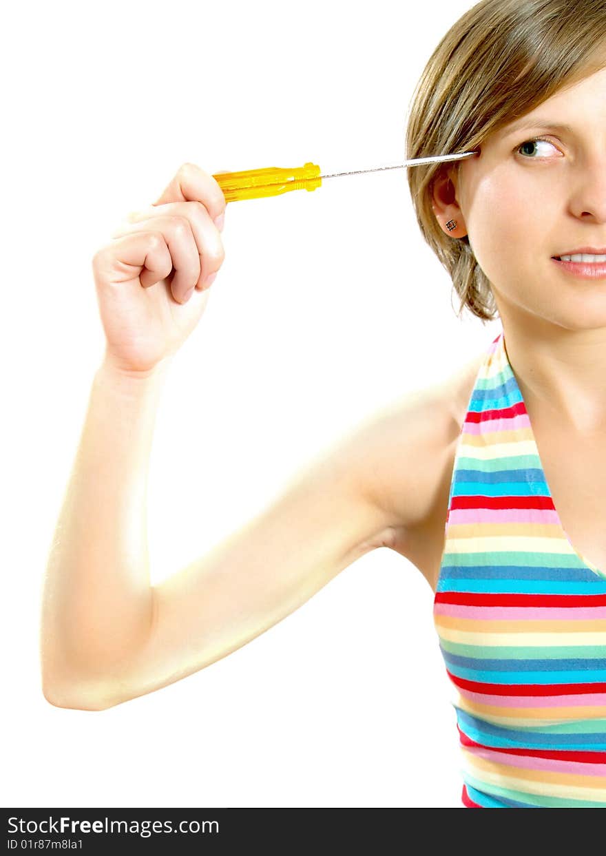 Portrait of a cute Caucasian blond girl with a nice colorful striped summer dress who is thinking and she is holding a screwdriver to her head. Isolated on white. Portrait of a cute Caucasian blond girl with a nice colorful striped summer dress who is thinking and she is holding a screwdriver to her head. Isolated on white.