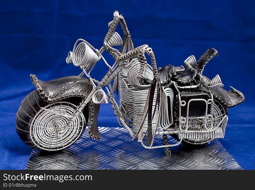 Wire frame easy rider chopper hand crafted on blue background. Wire frame easy rider chopper hand crafted on blue background