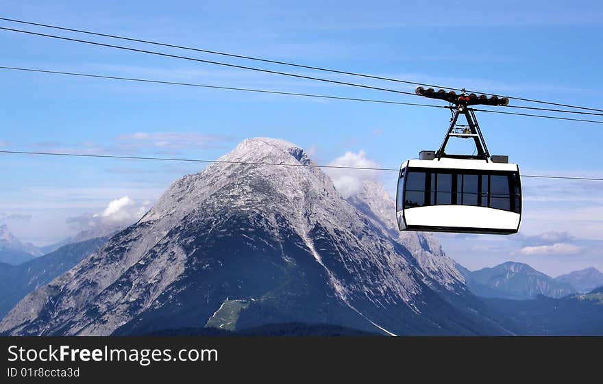 A cable way flying in the sky. A cable way flying in the sky.