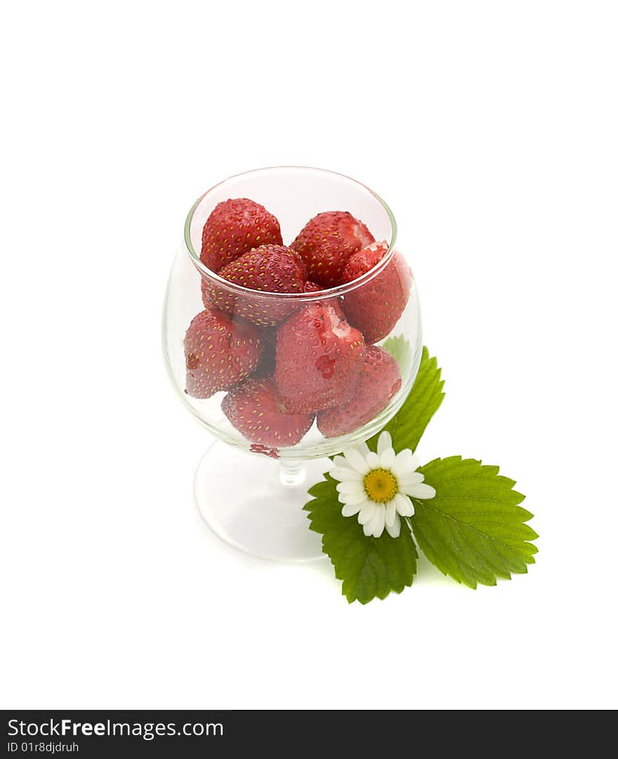 Strawberries in the glass isolated on white