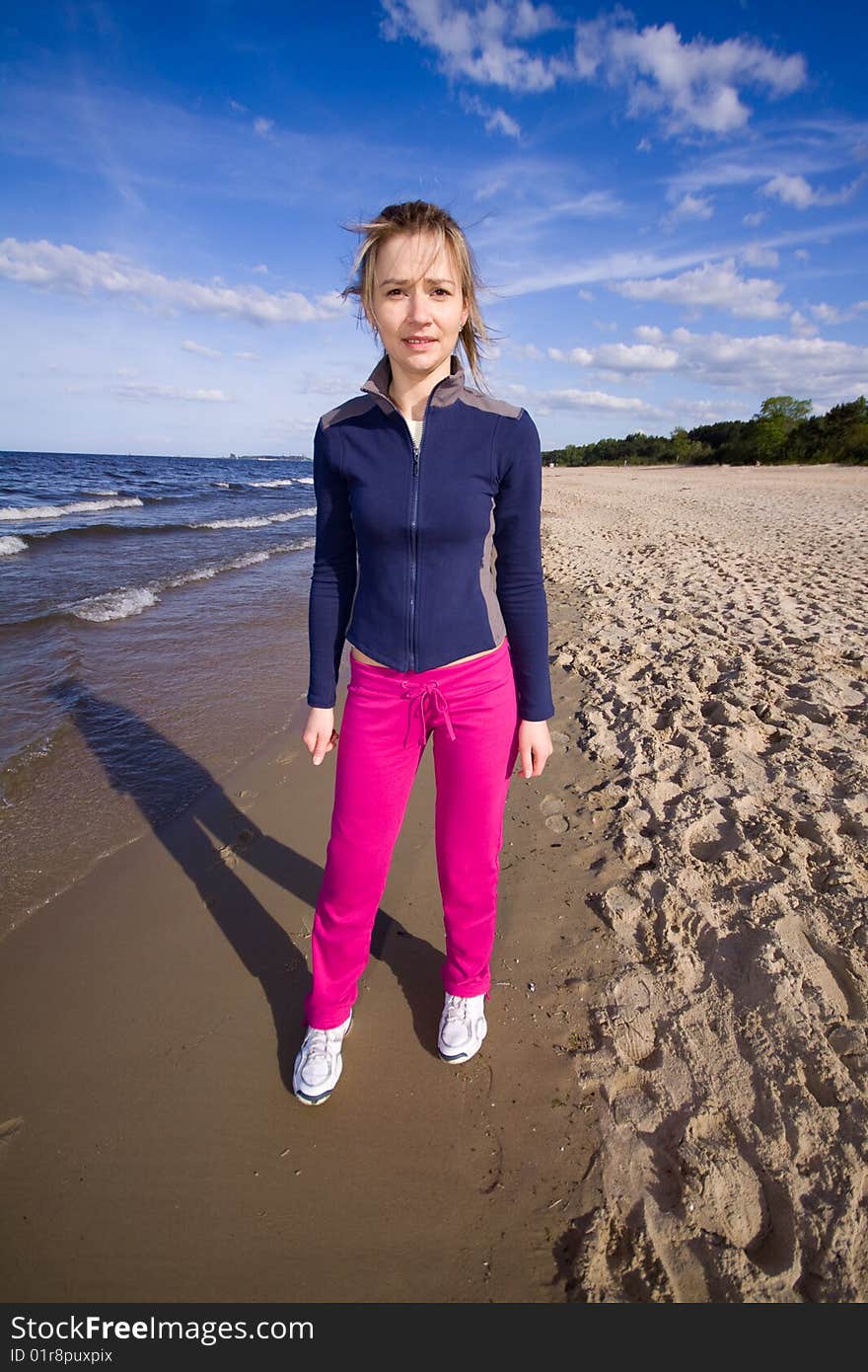 Active woman running on the beach. Active woman running on the beach